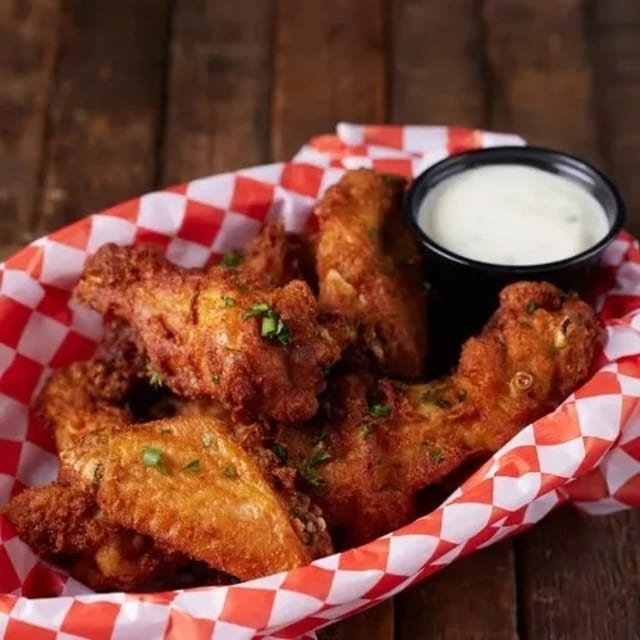 Chicken Wings with Fries.